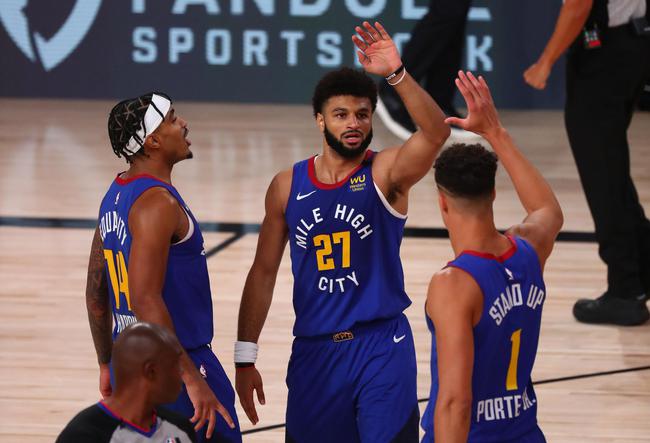 掘金约基奇豪取三双助球队连胜（约基奇砍下三双，助掘金再取连胜）